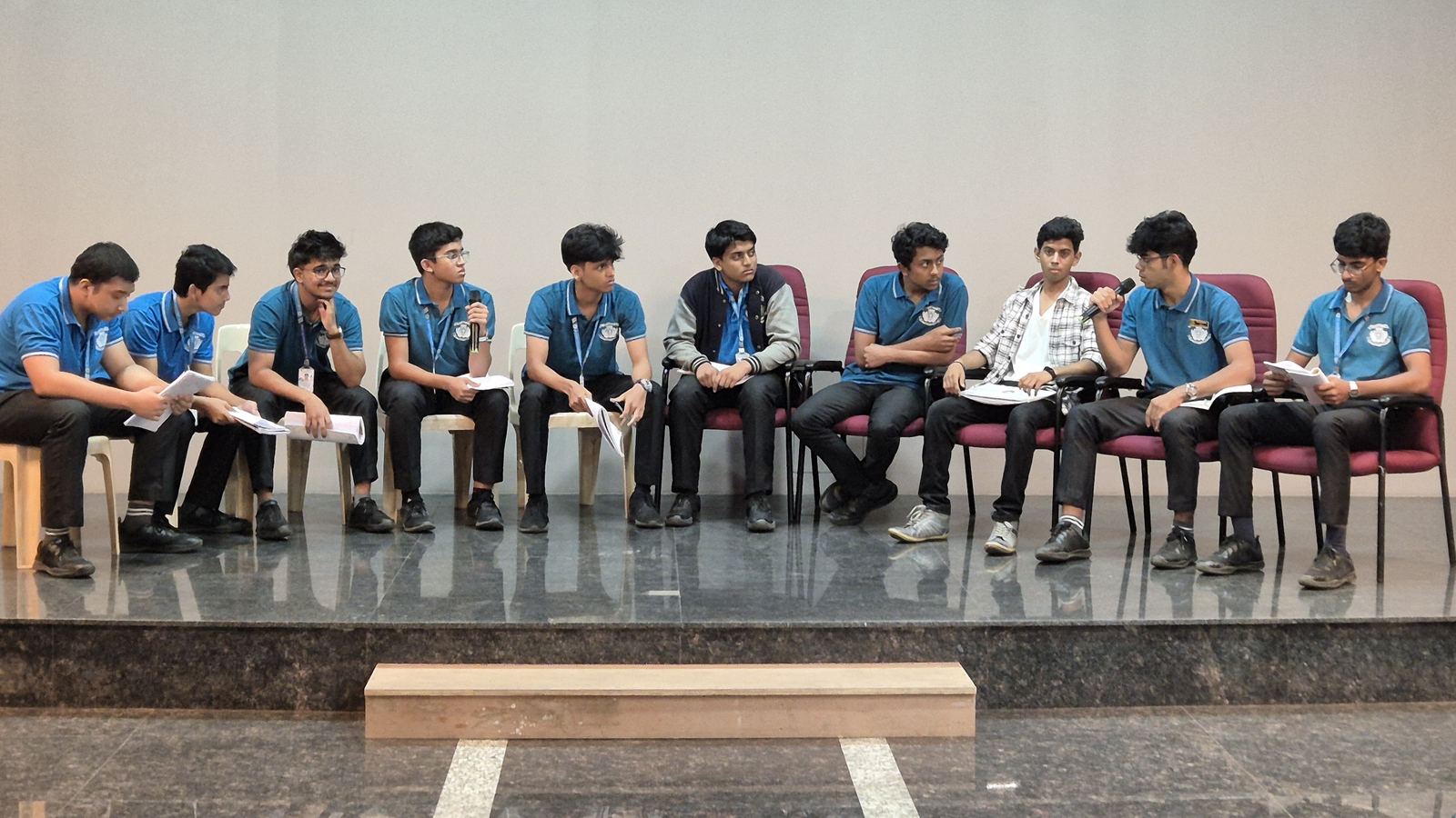 A student leadership panel on stage